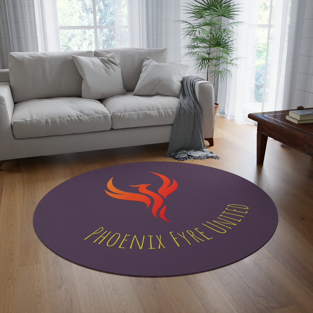 Phoenix Fyre United monogram Round Rug | elegant gold script logo on plum background